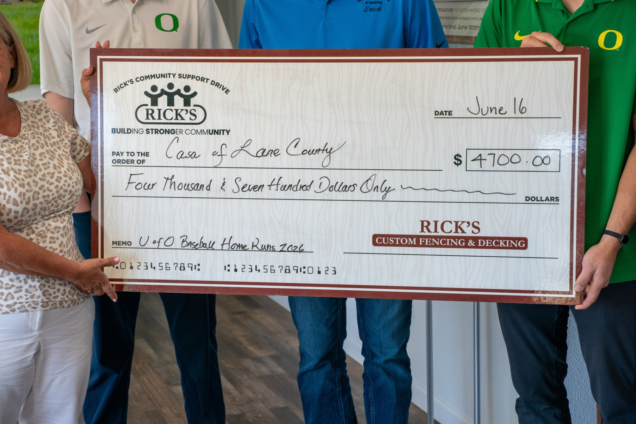 Close-up of check for $4,700 presented to CASA of Lane County
