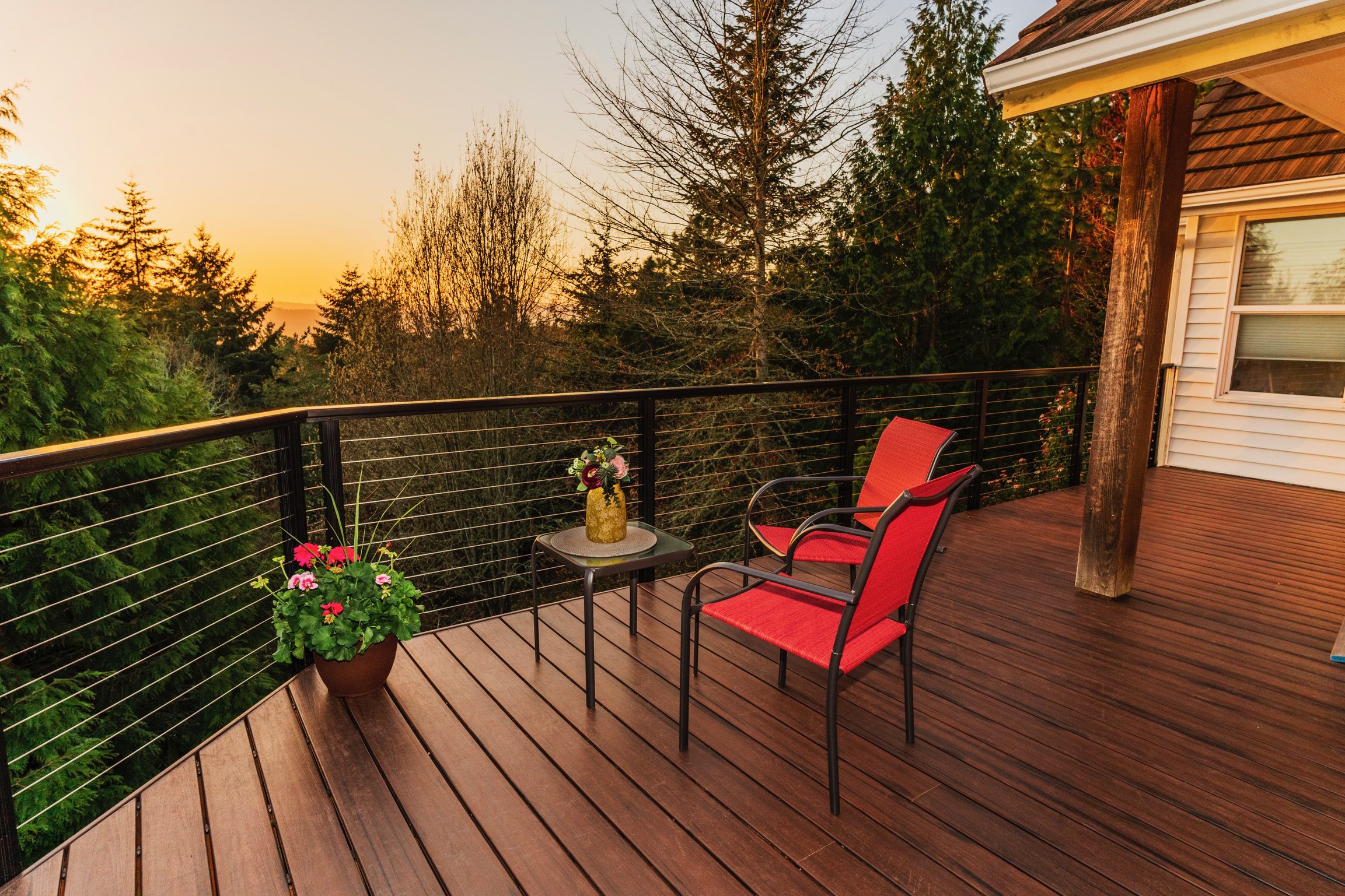 1095 Decking Armadillo Composite Armadillo deck with cable handrail at sunset