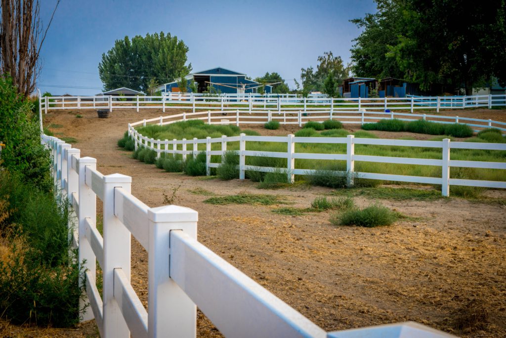 1027 Vinyl Pasture Rail Fencing Vinyl Pasture Rail Fence built by Rick's Custom Fencing and Decking