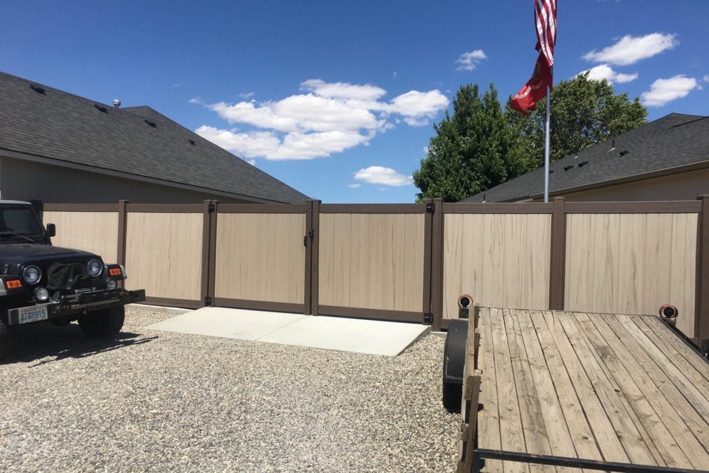 1058 Vinyl Privacy Fencing Vinyl Privacy Fencing with dark walnut post and rails and driftwood fence boards