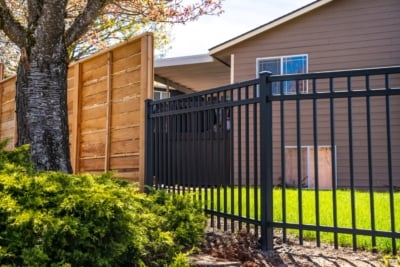 1083 Regis Aluminum Fencing Aluminum Fencing connecting to cedar fence