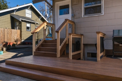 1068 Cedar Handrails Cedar railing with black balusters and composite cap