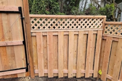 1028 Fencing Cedar Lattice Top A lattice top good neighbor fence with a gate.