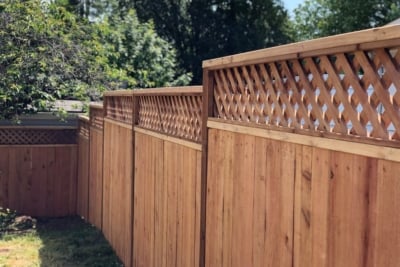 1034 Fencing Cedar Lattice Top A wooden diagonal lattice top fence.
