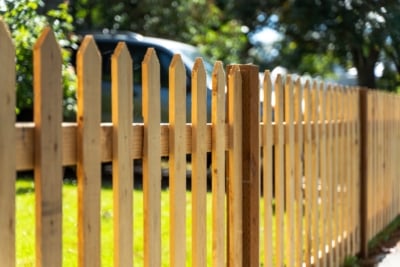 1007 Fencing Cedar Picket A pointed wooden picket fence.