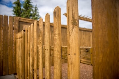 1008 Fencing Cedar Picket A close up of a cedar picket fence.