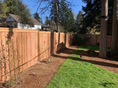 Solid style fence with top fascia trim