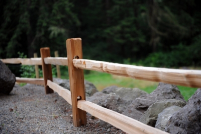 1002 Cedar Split Rail Fencing Cedar Split Rail Fencing in gravel.