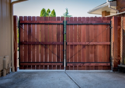1041 Cedar Gate Stained gate with dog eared boards