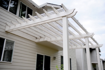1057 Covers Pergolas Vinyl attached vinyl pergola with clear panels