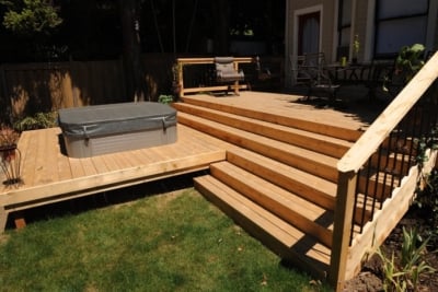 1050 Decking Cedar Port Orford cedar deck with a hot tub