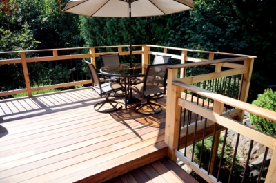1018 Decking Tigerwood Hardwood deck and custom cedar handrail