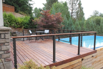 1024 Decking Tigerwood Tigerwood deck with cedar skirting and pool