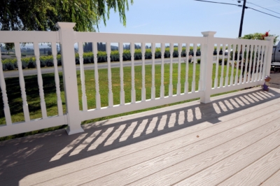 1035 Vinyl Handrails. white vinyl handrail with colonial pickets