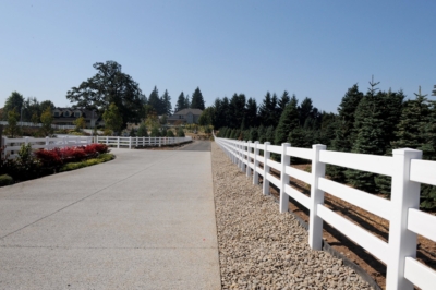 1056 Vinyl Pasture Rail Fencing Vinyl Pasture Rail Fencing going down a driveway