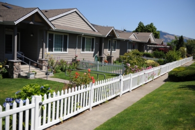 1029 Vinyl Picket Fencing Vinyl Picket Fencing next to sidewalk