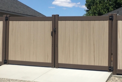 1057 Vinyl Privacy Fencing Vinyl Privacy Fencing with dark walnut post and rails and driftwood fence boards