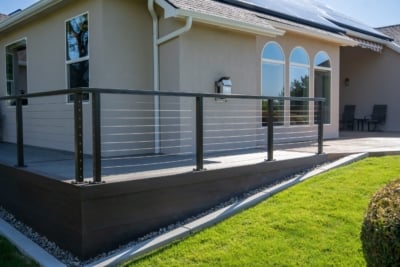 Aluminum cable railing on a two-tone deck